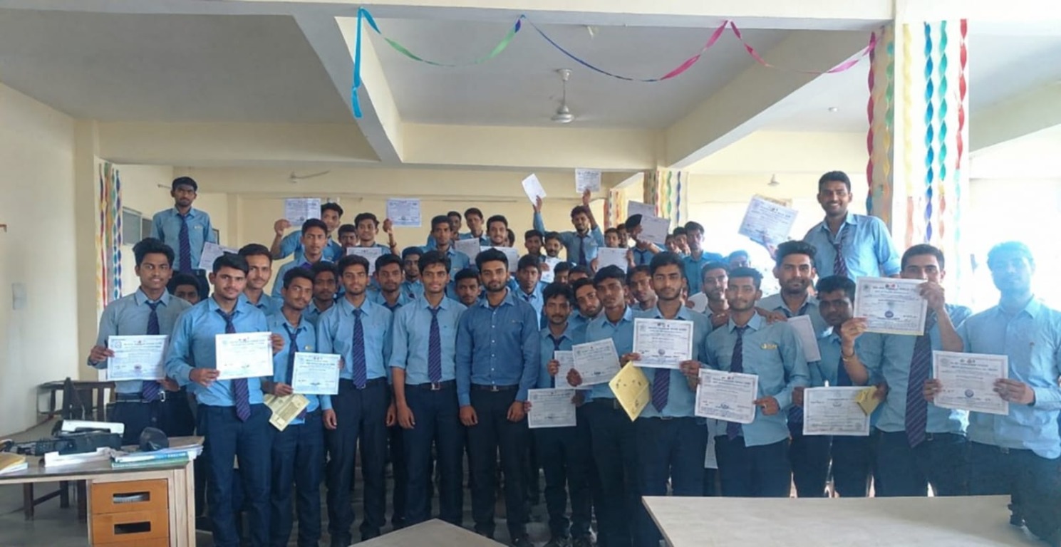 DTCI students celebrating their certificates in the classroom